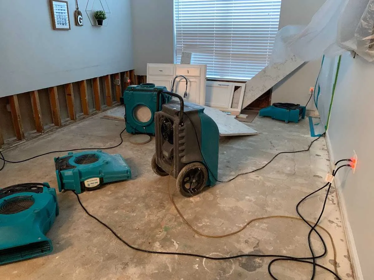 Dehumidifier in flood-cut room for Water Damage Restoration in Poinciana
